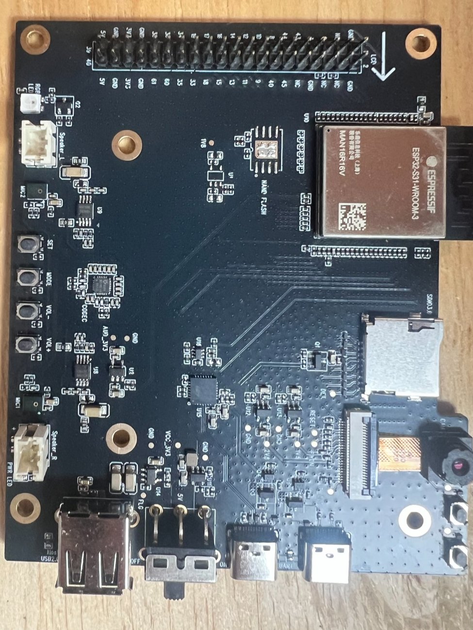 The bare development board: a black circuit board with an Espressif module, a microSD slot, and USB ports